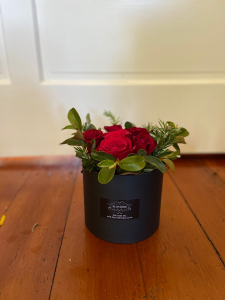 Flowers In A Hat Box
