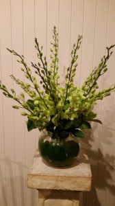 Fishbowl Of Green Orchids