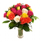  - Gift a moment of happiness with 24 mixed colour luxury roses beautifully arranged in a glass vase.


 