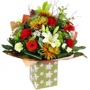  - Add a touch of luxury to your Christmas gifting with this bold bouquet of festive blooms in red, white, and green.

