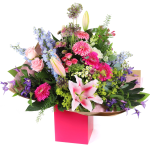  - Show your grand affection with a luxurious seasonal bouquet in elegant pinks, purples, and blues — beautifully presented to make a lasting statement.
