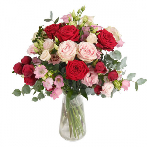  - Bouquet of pink and red tones to include roses and filler flower with beautiful foliage.