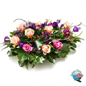  - Purple and pink Funeral arrangement to include roses.
