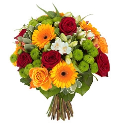  - Round short-stemmed bouquet of Gerberas and roses in orange and red tones, as well as various white and green seasonal flowers accompanied by a little greenery.   