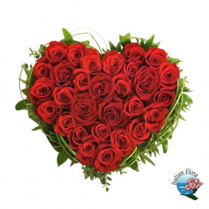  - Bouquet of red roses made in a heart shape with foliages.