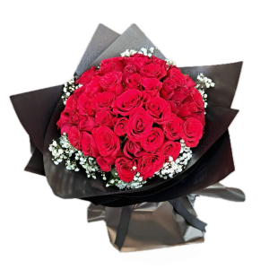  - Handtied of beautiful red roses with gyp.