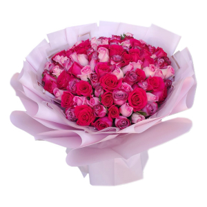  - Handtied of mixed roses in pinks, lilacs and reds.