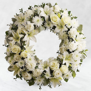  - Funeral wreath made using fresh white flowers to include roses and lillies